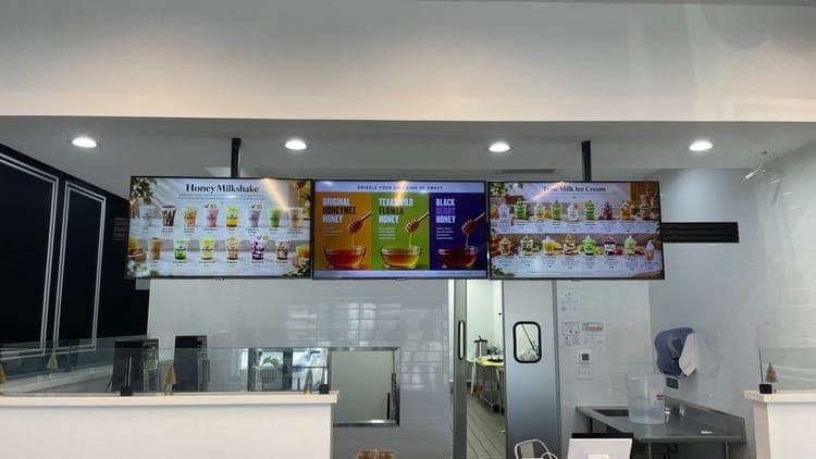Honeymee Houston Alief counter under three menu screens